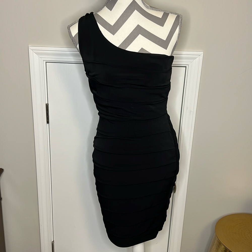 Form fitting little black dress